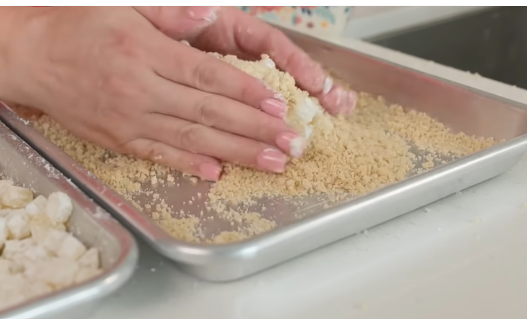 Mixing Korean corn dog batter in a bowl