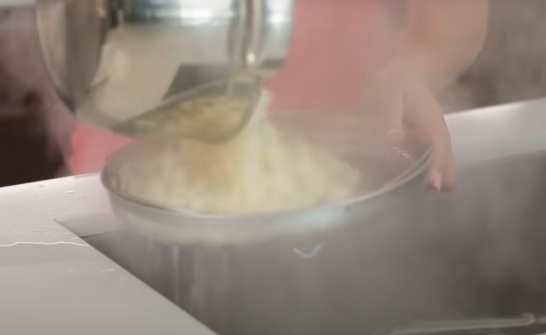 Korean corn dog ready to be coated in batter